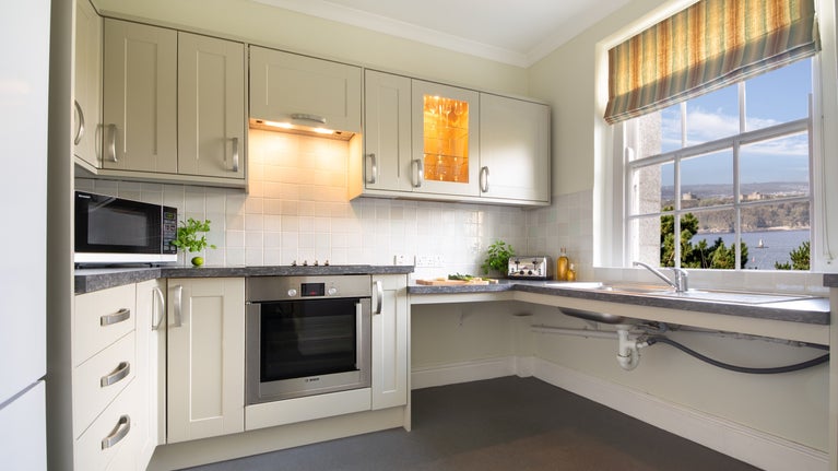The kitchen at The Major's Quarter, with sea views towards Falmouth, Cornwall